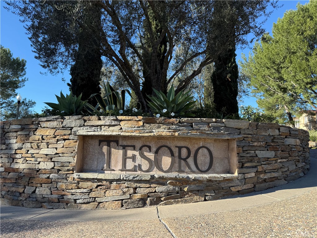 32 Marisol Newport Coast, CA 92657 - Photo 57 of 61 a street sign on a sidewalk next to a road