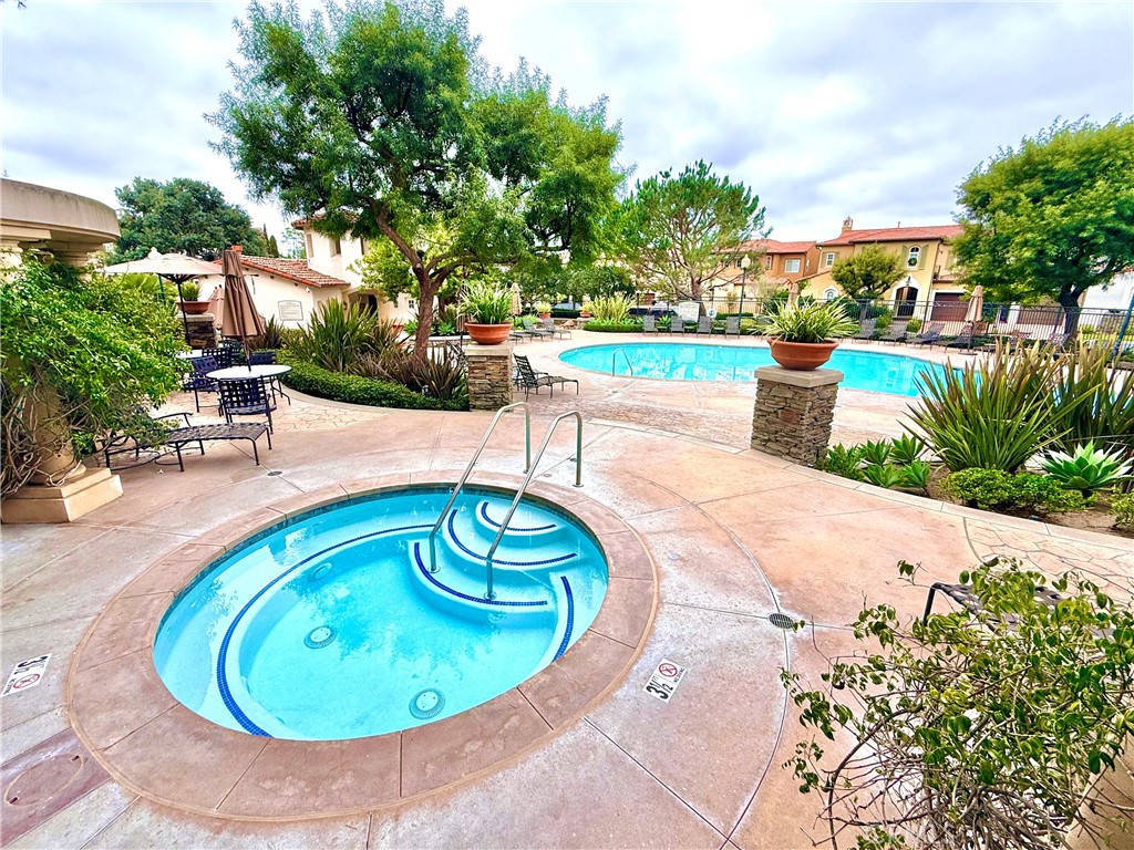 32 Marisol Newport Coast, CA 92657 - Photo 59 of 61 a view of a swimming pool with a patio and plants