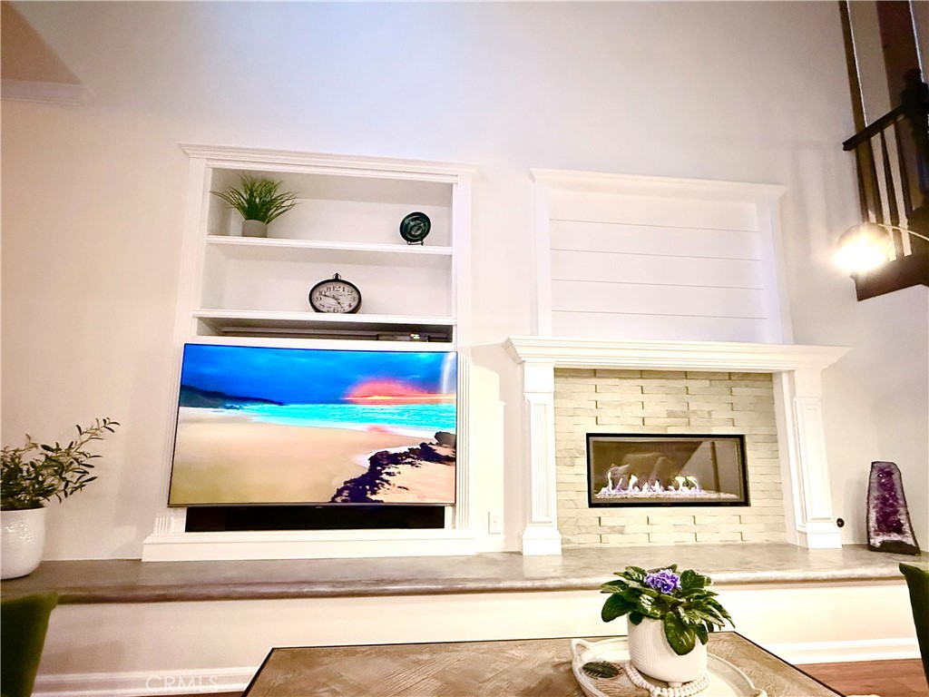 32 Marisol Newport Coast, CA 92657 - Photo 9 of 61 a picture of a living room with a rug and a large window
