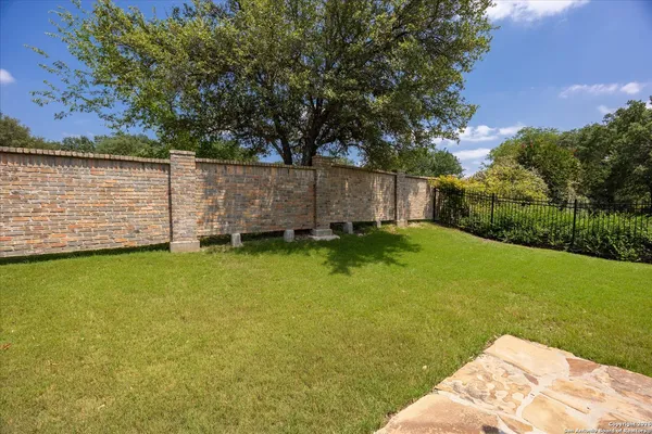 a view of a backyard with a small cabin