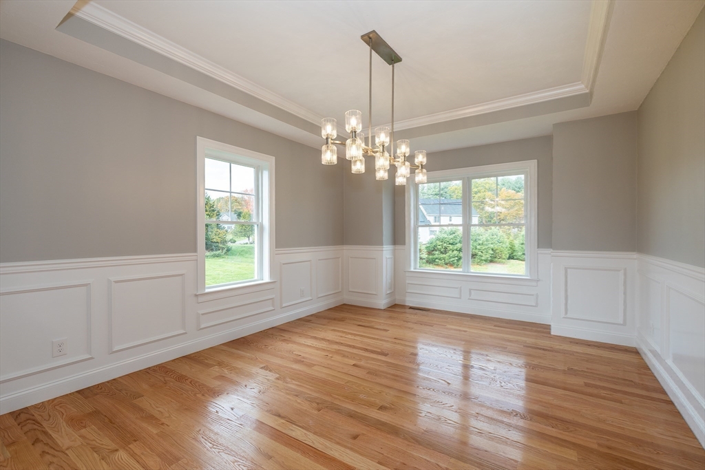 254 Concord Road, Unit LOT 2A Westford, MA 01886 - Photo 14 of 29 a view of a room with window and wooden floor