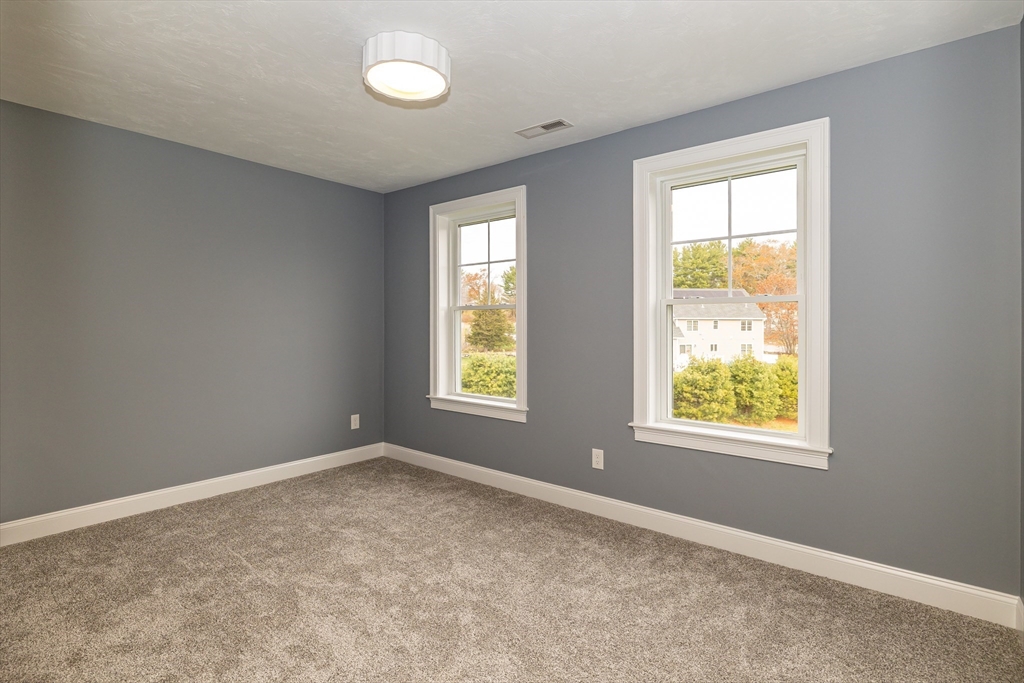 254 Concord Road, Unit LOT 2A Westford, MA 01886 - Photo 27 of 29 an empty room with a window