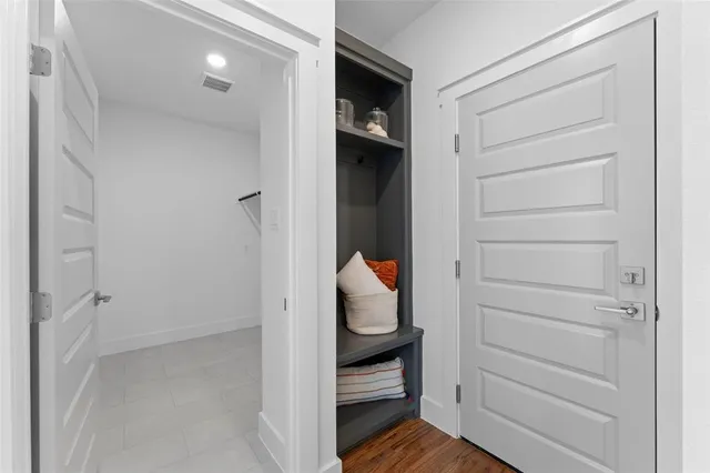 a view of a room with kitchen island granite countertop furniture and a view of living room