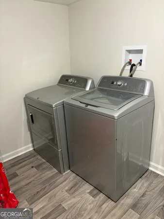 a utility room with washer and dryer