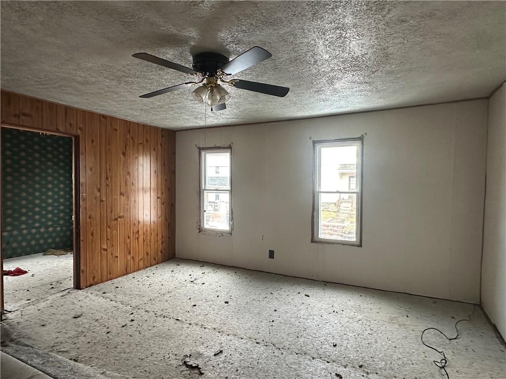 305 West 9th Avenue Tarentum, PA 15084 - Photo 12 of 22 a view of a livingroom with a ceiling fan and window