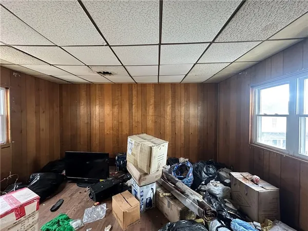 a kitchen with stainless steel appliances a sink stove and cabinets