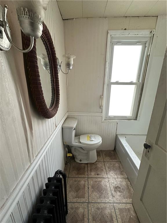 305 West 9th Avenue Tarentum, PA 15084 - Photo 19 of 22 a bathroom with a toilet a sink and mirror