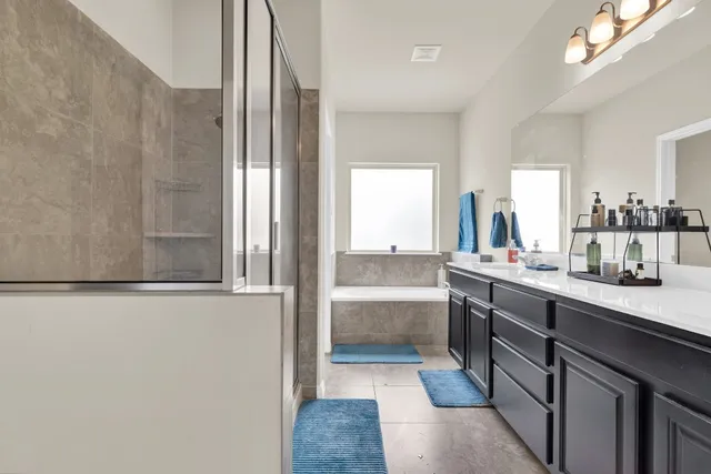 a view of a room with chairs and furniture