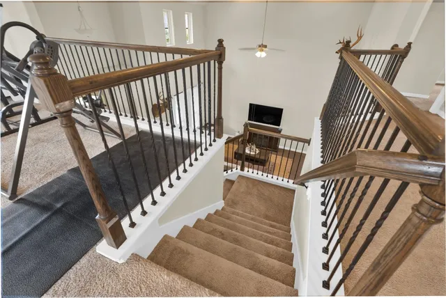 a view of living room with furniture and a flat screen tv