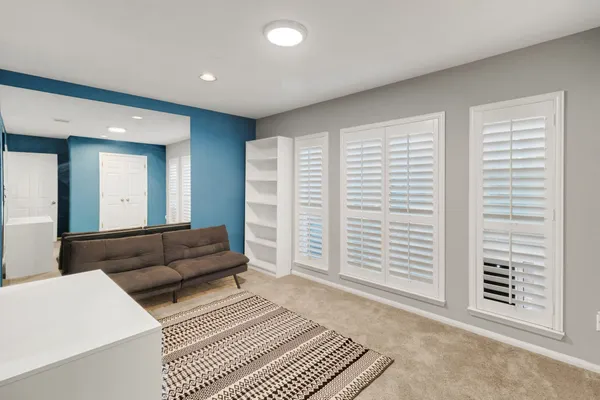 a view of livingroom with furniture and window