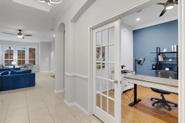 a room with a bed and furniture