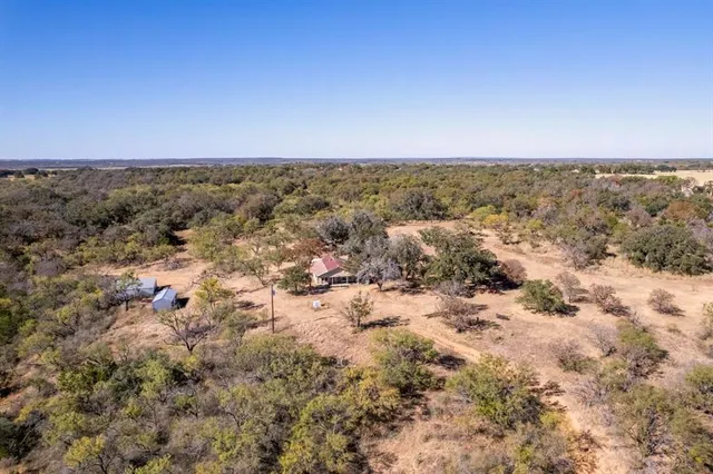 an aerial view of beach and ocean