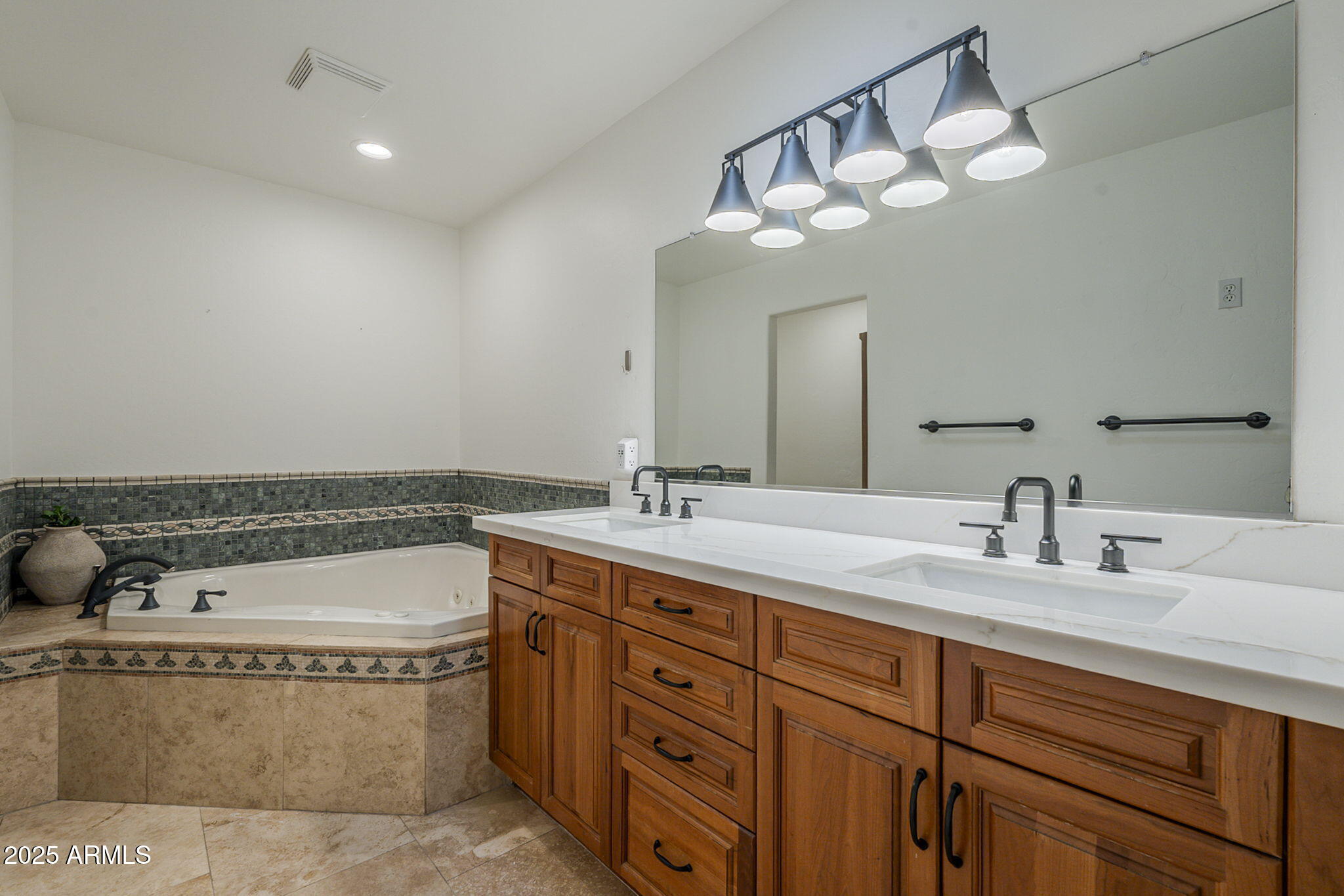6302 East Cochise Road Paradise Valley, AZ 85253 - Photo 8 of 44 a bathroom with a granite countertop sink a large mirror and a toilet