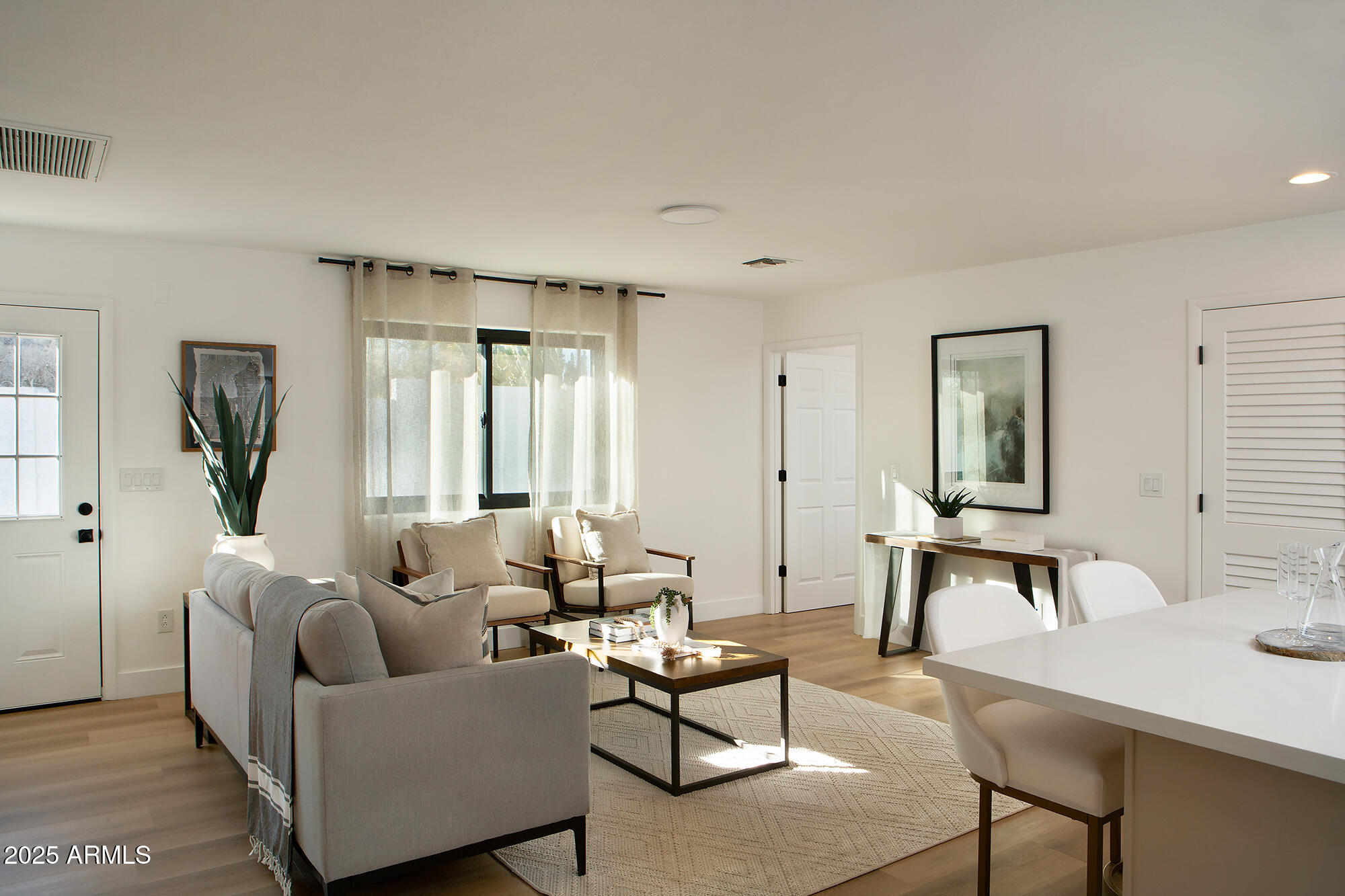 6302 East Cochise Road Paradise Valley, AZ 85253 - Photo 25 of 44 a living room with furniture and a window