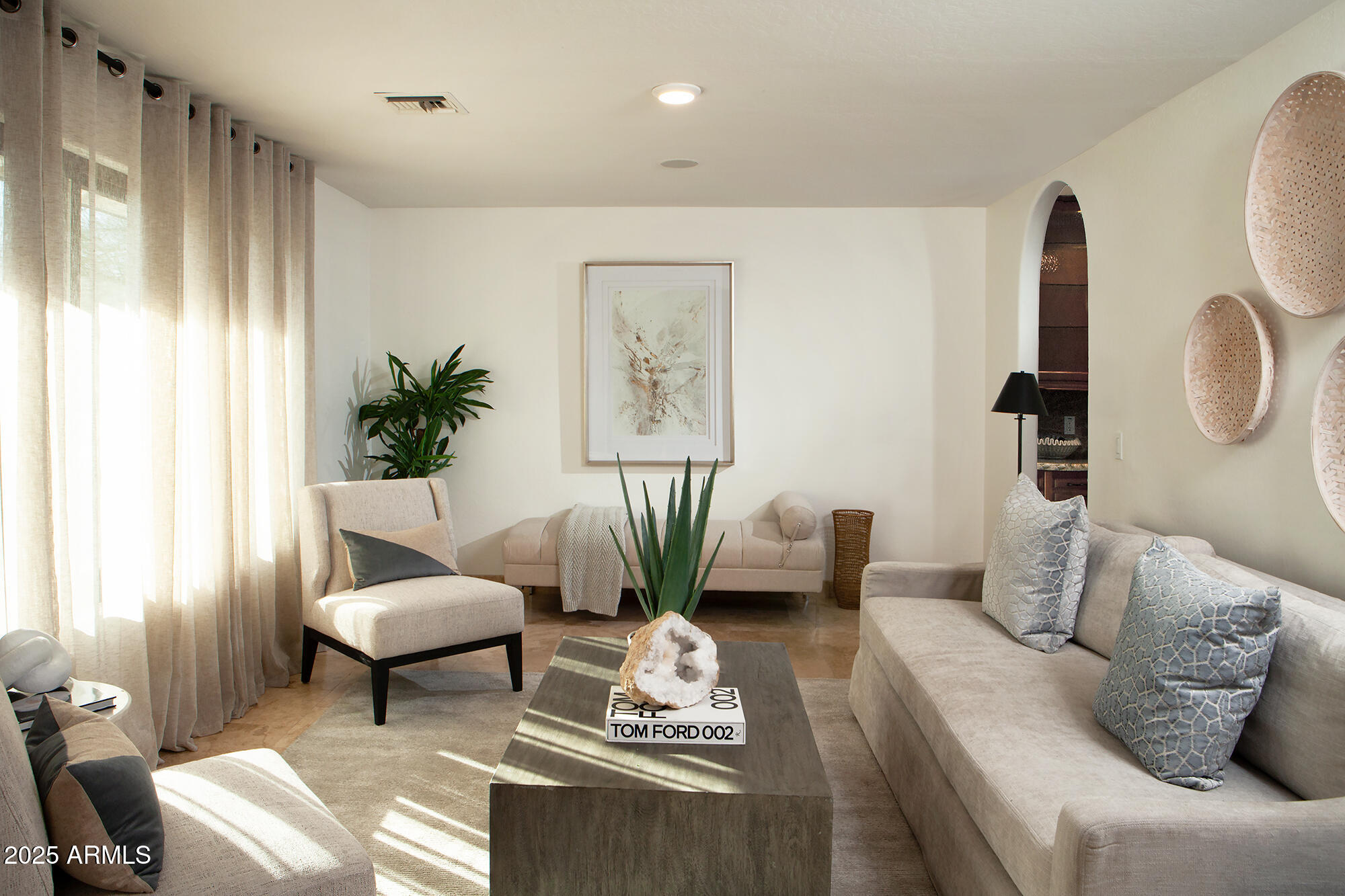 6302 East Cochise Road Paradise Valley, AZ 85253 - Photo 2 of 44 a living room with furniture and a large window