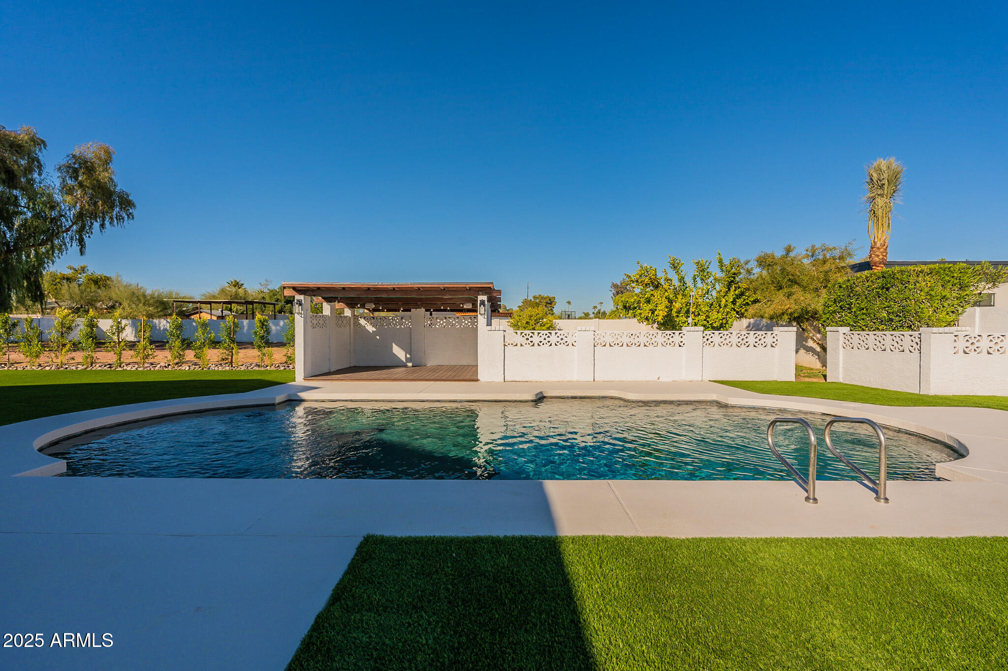 6302 East Cochise Road Paradise Valley, AZ 85253 - Photo 33 of 44 a view of a yard with an outdoor space