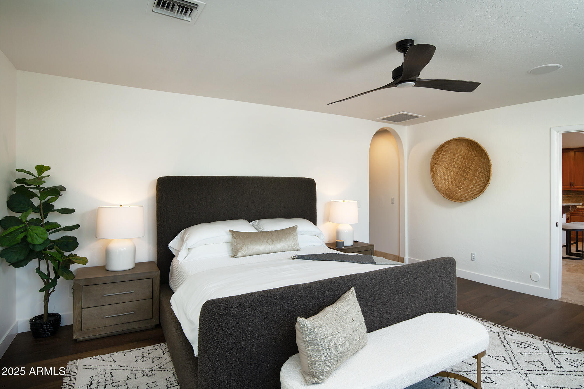 6302 East Cochise Road Paradise Valley, AZ 85253 - Photo 5 of 44 a bedroom with a bed and a potted plant