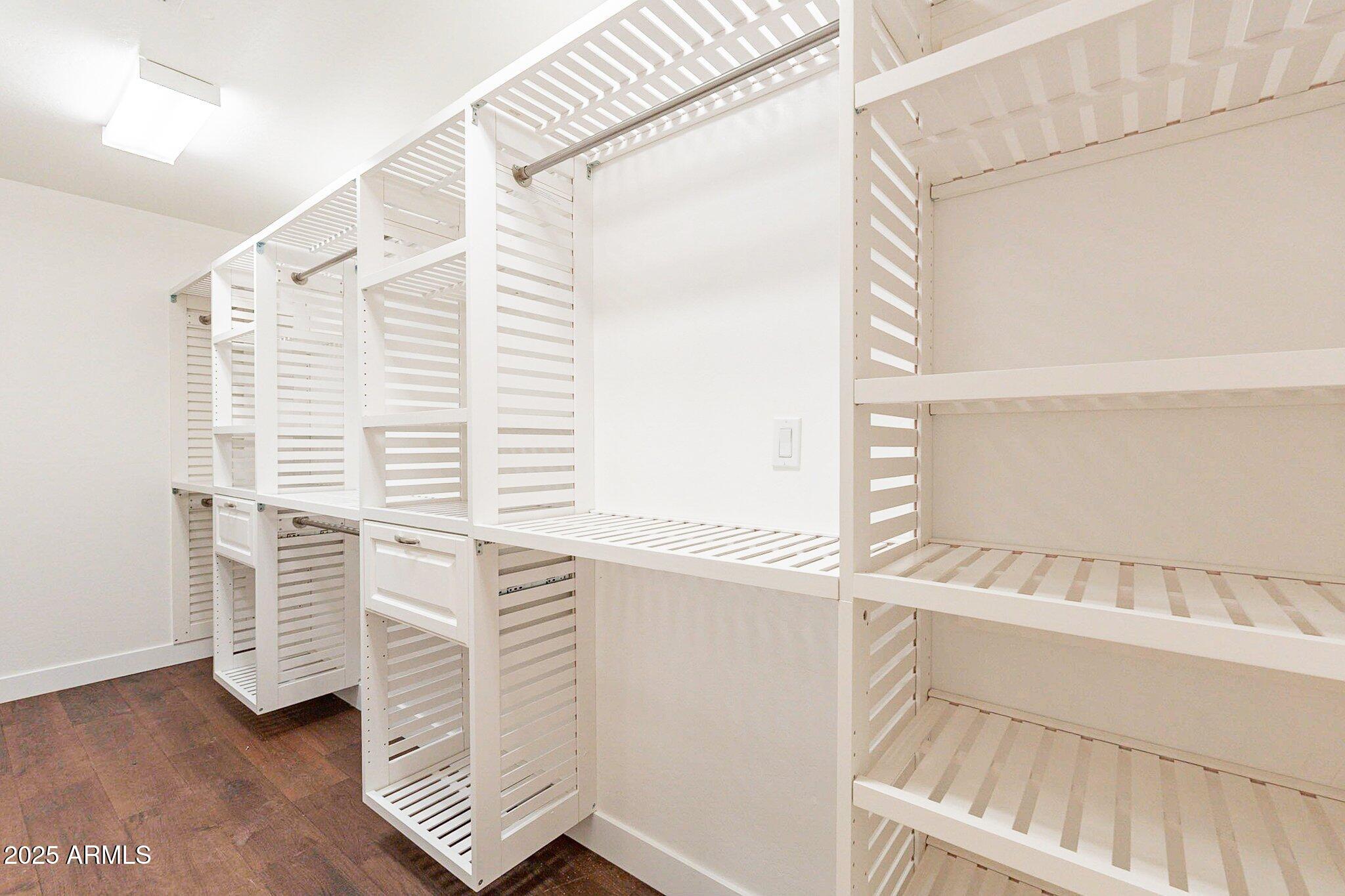 6302 East Cochise Road Paradise Valley, AZ 85253 - Photo 6 of 44 a view of walk in closet with empty racks