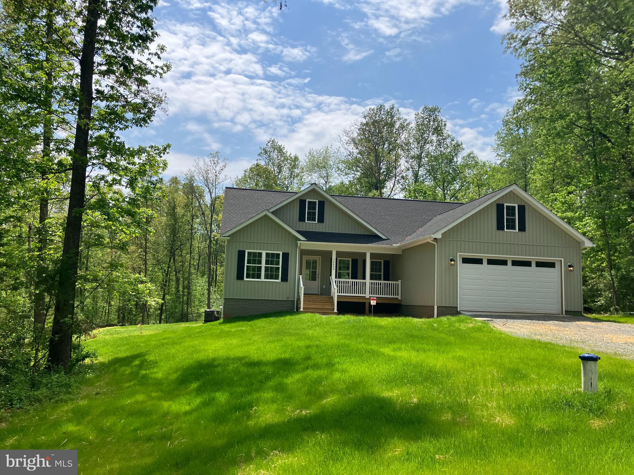 14400 Reva Road Reva, VA 22735 - Photo 1 of 9 a front view of house with yard and green space