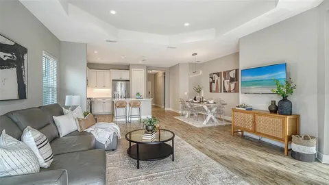 a living room with furniture and a table