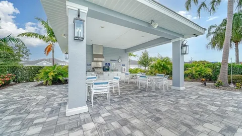 a view of an chairs and table in the patio