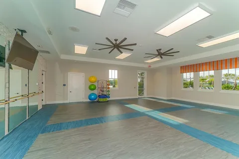 a view of a room with gym equipment
