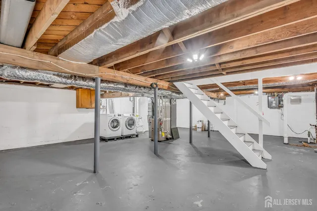 a view of a room with wooden walls