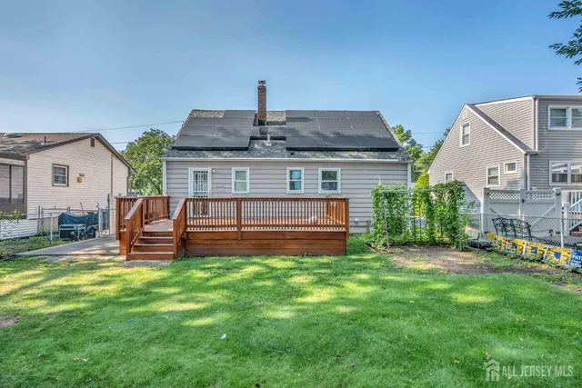 a house view with a sitting space and garden