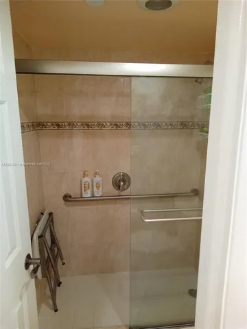 a bathroom with a sink a toilet and a bathtub