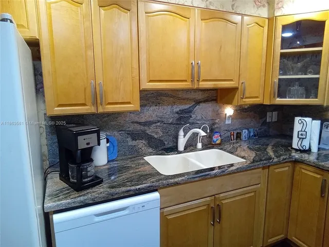 an empty room with wooden floor