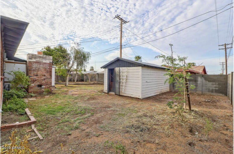3249 West Citrus Way Phoenix, AZ 85017 - Photo 22 of 22 a view of a house with a backyard