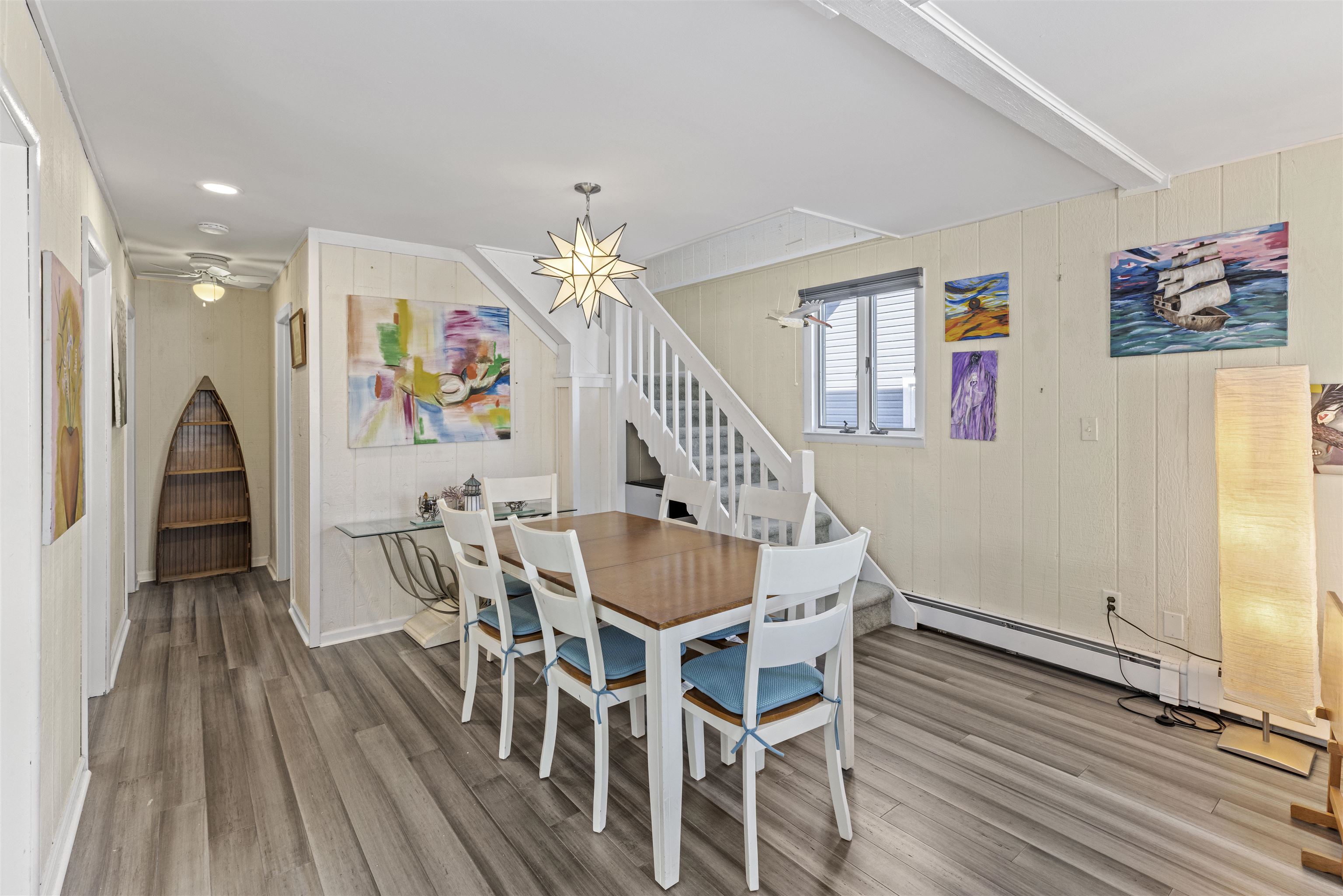 2 Fernwood Road Cape May, NJ 08204 - Photo 3 of 26 a dining room with furniture entryway and wooden floor