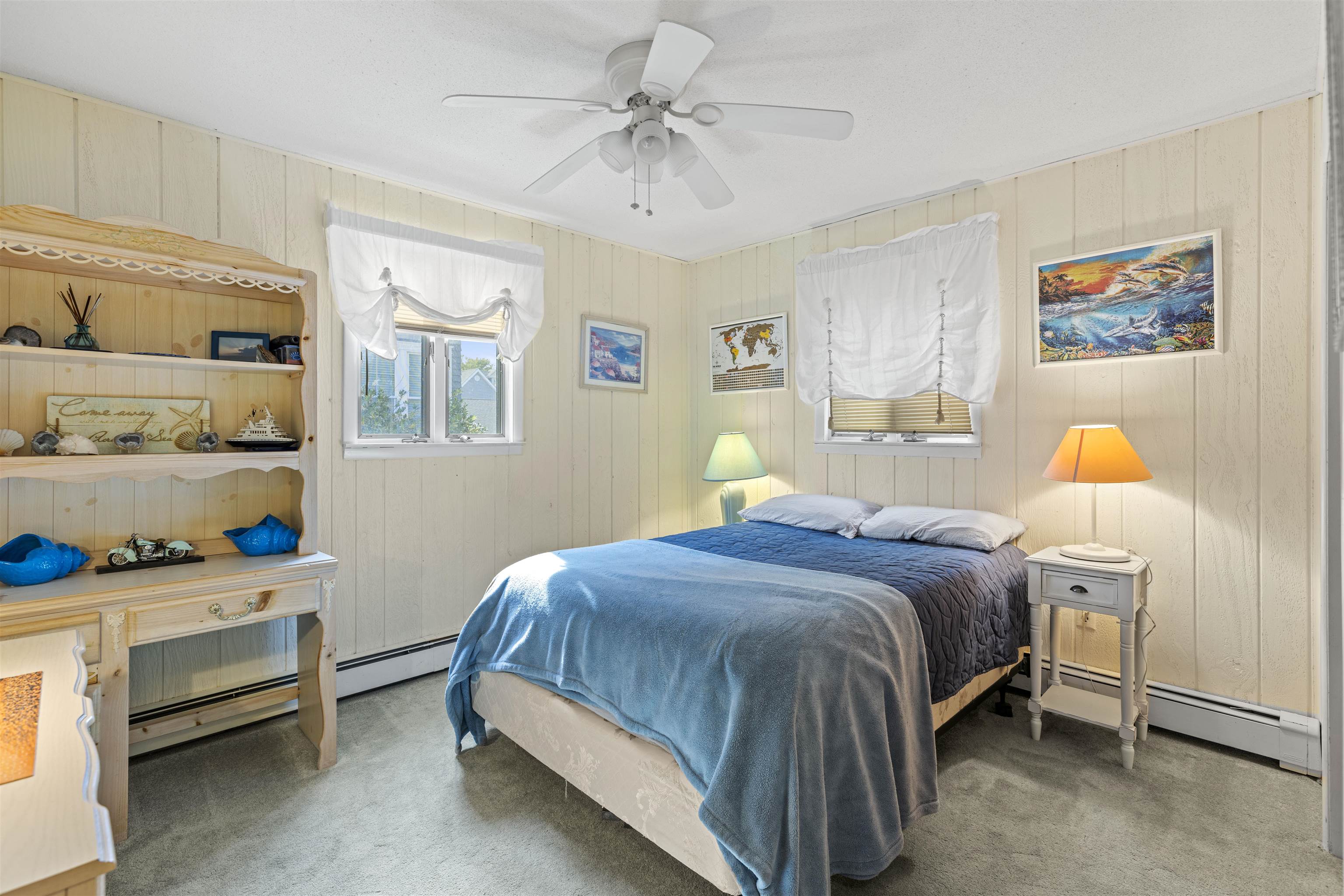 2 Fernwood Road Cape May, NJ 08204 - Photo 8 of 26 a bedroom with a bed and a window