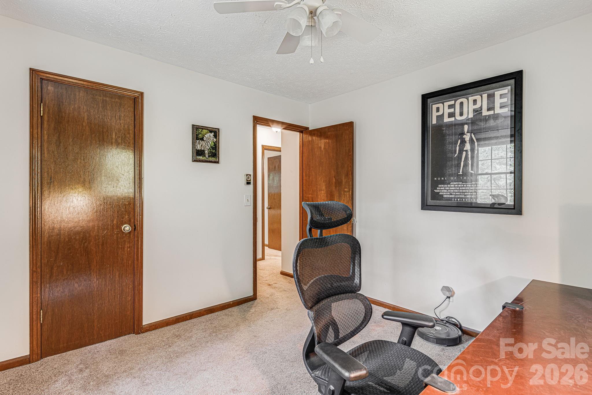 61 Spring Cove Drive Brevard, NC 28712 - Photo 22 of 39 a view of a workspace with furniture and a window