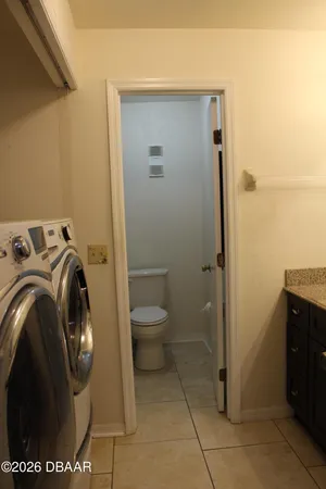 a view of bathroom with washing machine