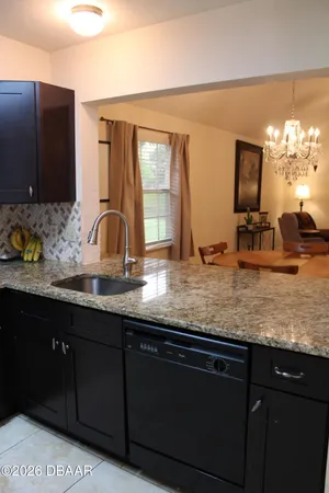 a bathroom with sink and mirror