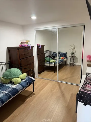 a bedroom with furniture