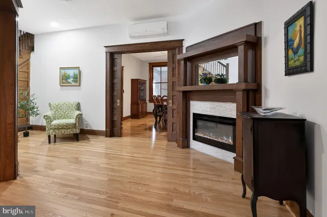 a view of a dining room with furniture and window