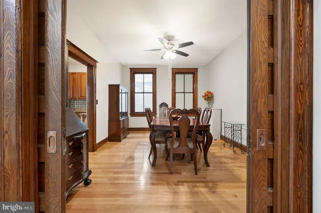 a kitchen with granite countertop a stove top oven microwave and cabinets