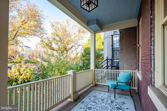 a view of a chair in a balcony