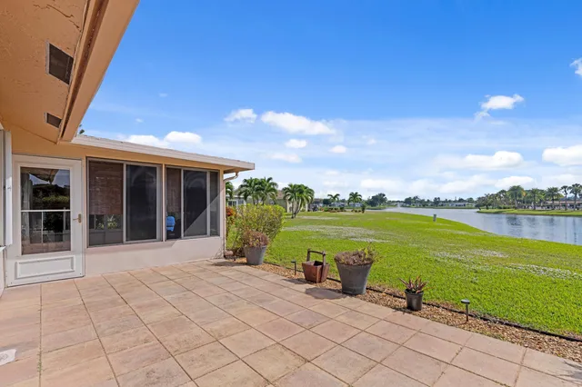 a picture of a room with a white wall and white cabinet