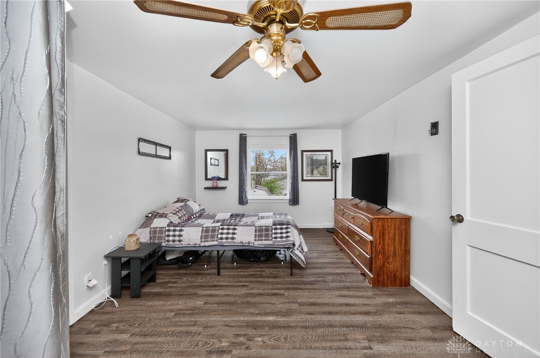 3301 Wildwood Road Middletown, OH 45042 - Photo 33 of 68 This cozy bedroom features durable flooring and a ceiling fan, offering a comfortable personal retreat.