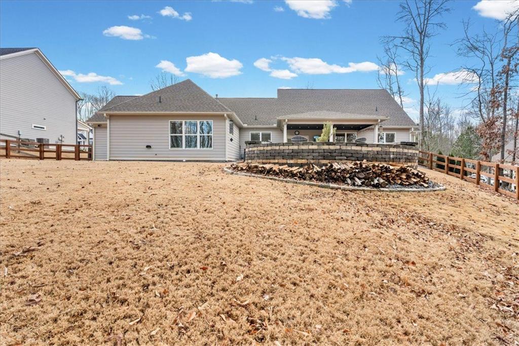 7705 Wandering Oak Way Cumming, GA 30041 - Photo 45 of 57 a front view of house with yard