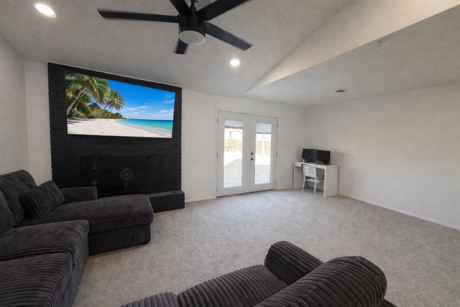 5308 48th Street Lubbock, TX 79414 - Photo 4 of 12 a living room with furniture and a flat screen tv