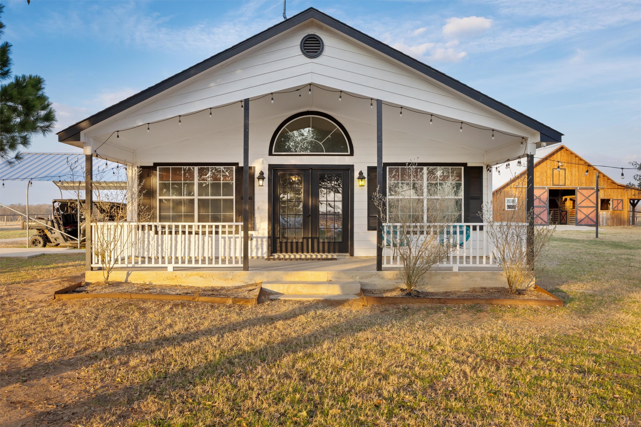 178 Balch Road Elgin, TX 78621 - Photo 33 of 40 a front view of a house with a garden and yard