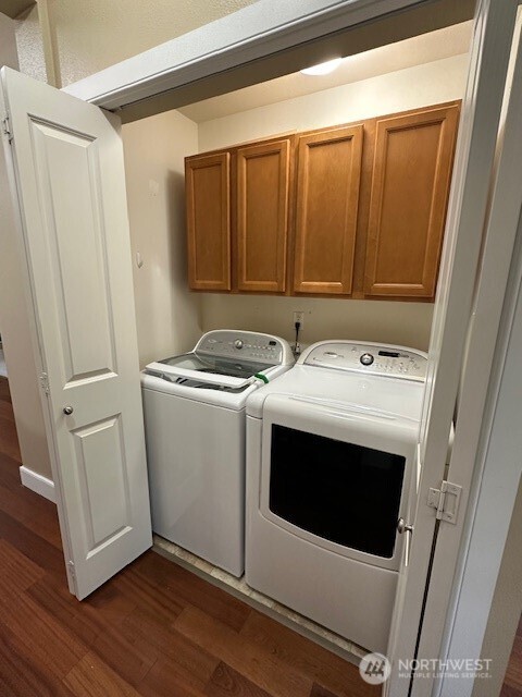 23943 Northeast 115th Lane, Unit 204 Redmond, WA 98053 - Photo 17 of 24 a utility room with dryer and washer