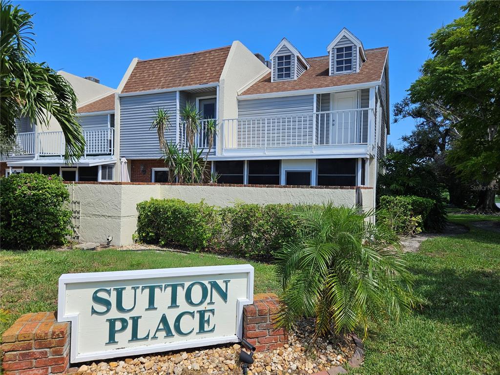 744 Cadiz Road, Unit 1 Venice, FL 34285 - Photo 2 of 46 a view of a wooden house with a yard