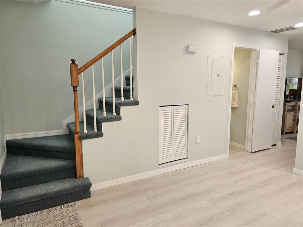 744 Cadiz Road, Unit 1 Venice, FL 34285 - Photo 26 of 46 a view of entryway and hall with wooden floor