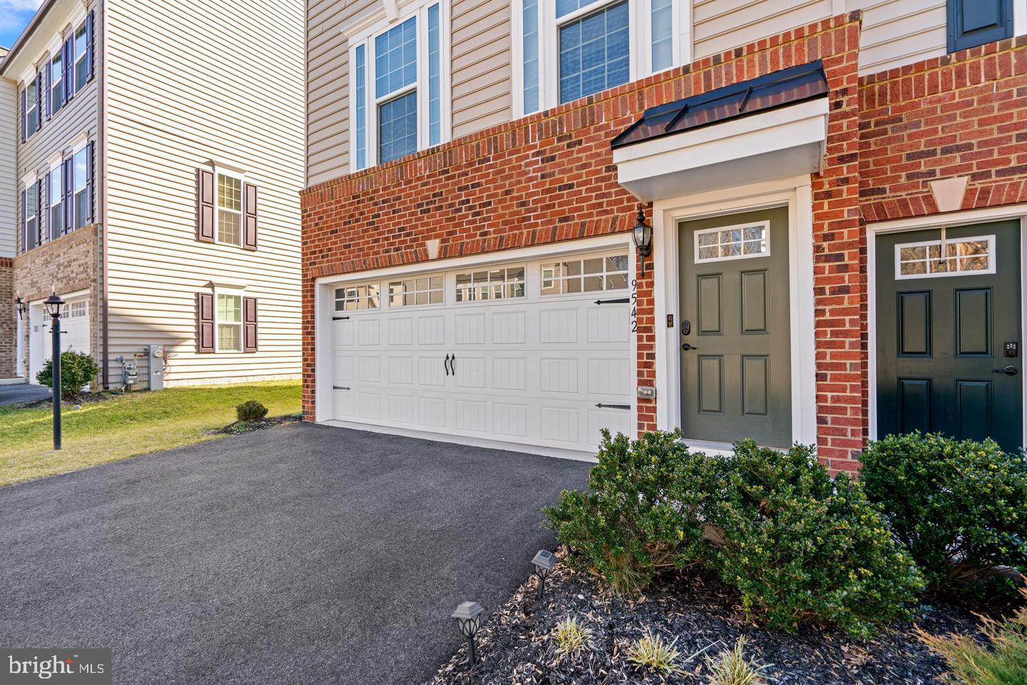 9542 Watts Road Owings Mills, MD 21117 - Photo 2 of 37 Charming townhouse with inviting curb appeal.