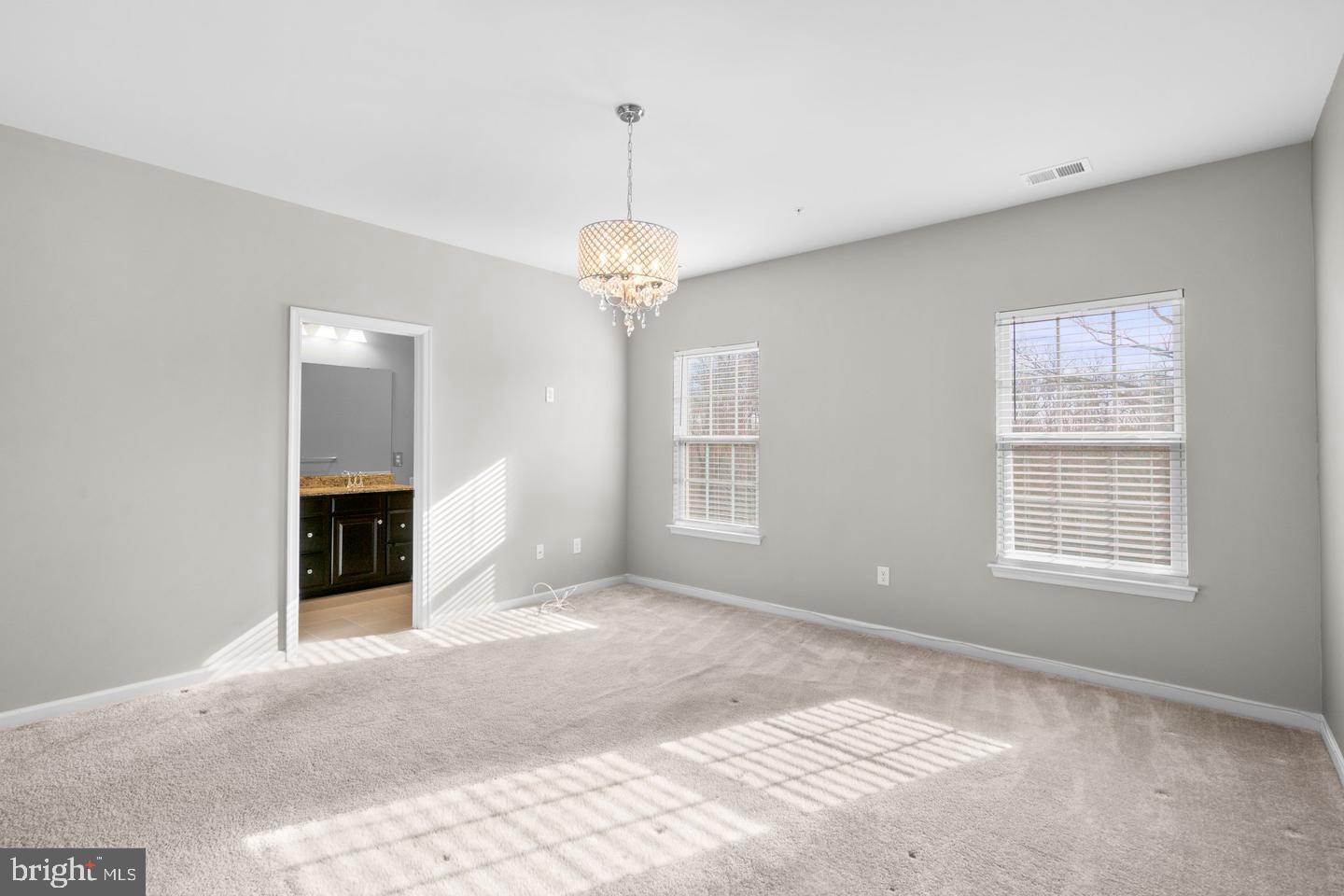 9542 Watts Road Owings Mills, MD 21117 - Photo 22 of 37 Bright and airy room with elegant lighting.